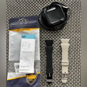 2 Versa Fitbit bands with charger